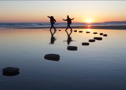 people walking on beach