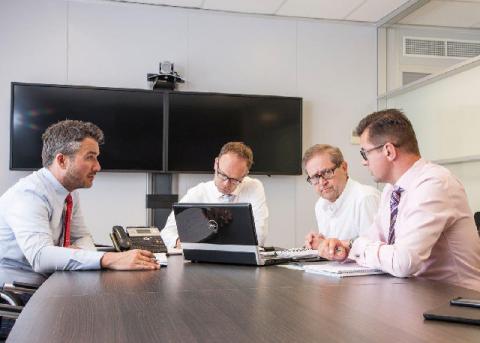 men in conference room